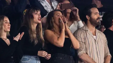 Getty Images Taylor Swift, Blake Lively and Ryan Reynolds