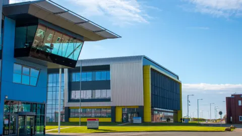 Cranfield University University buildings against a blue skyline 