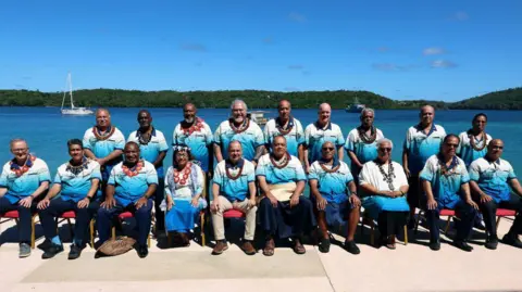 Getty Images Prime Minister of Tonga (C, front row) Hu'akavameiliku poses for a group picture with Pacific Island Forum (PIF) Leaders at the end of a retreat in Neiafu, Vava'u, Tonga on August 29, 2024