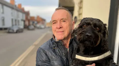 A man and his dog on Ibstock High Street