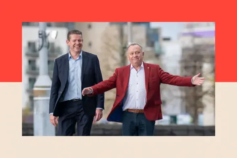 Getty Images Rhun ap Iorwerth walks with a jubilant Lindsay Whittle following his victory 