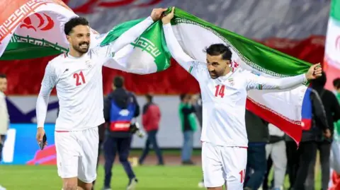 Iran's players celebrate after the FIFA World Cup 2026 Asia zone qualifiers