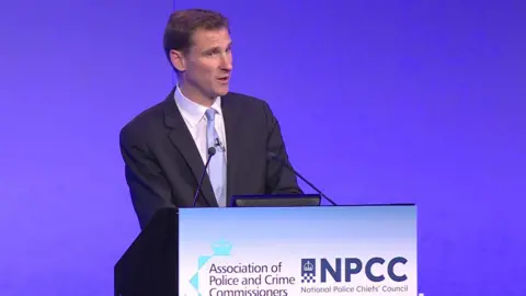 Shadow home secretary Chris Philp addresses the National Police Chiefs' Council (NPCC) and Association of Police and Crime Commissioners conference