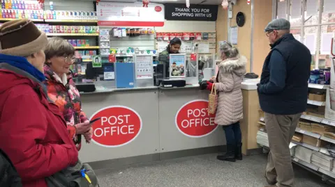 BBC / Naj Modak Customer in Post Office