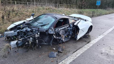 Damage to a super car after a crash on M54