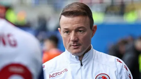 Close-up image of Reading boss Noel Hunt.