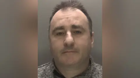 A mug shot of Christopher Sanders