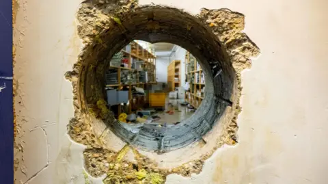 Gelsenkirchen Police A hole in a wall created by a large drill