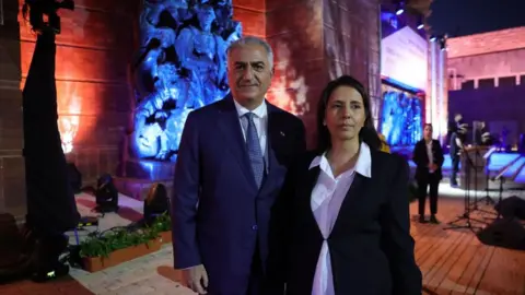 EPA-EFE/REX/Shutterstock Reza Pahlavi (L) with Gila Gamliel (R), the minister of intelligence of Israel, attending the Holocaust Martyrs' and Heroes' Remembrance Day's official state opening ceremony at the Yad Vashem Holocaust memorial museum in Jerusalem on 17 April 2023