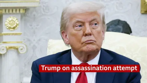 Donald Trump sitting on a yellow chair in the oval office with a graphic on screen that reads 'Trump on assassination attempt'.