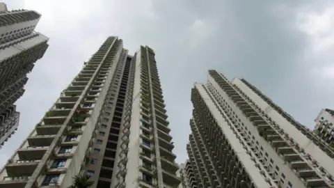 High-rise apartment buildings in Forest City seen from below
