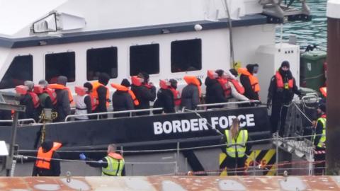 Migrants being brought ashore in Dover on Easter Saturday