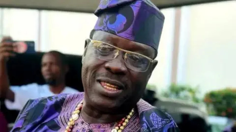 Nigerian actor Taiwo Hassan popularly called Ogogo dressed in native Yoruba attire