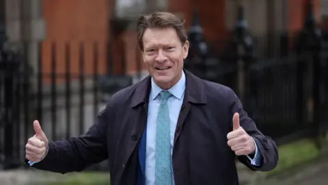 Reuters Reform MP Richard Tice giving two thumbs up