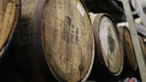 Maya Pistola Agavepura Barrels containing distiller Maya Pistola Agavepura.