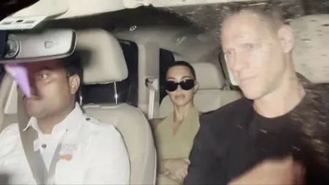 Reuters Kim Kardashian seen leaving Mumbai airport in a car