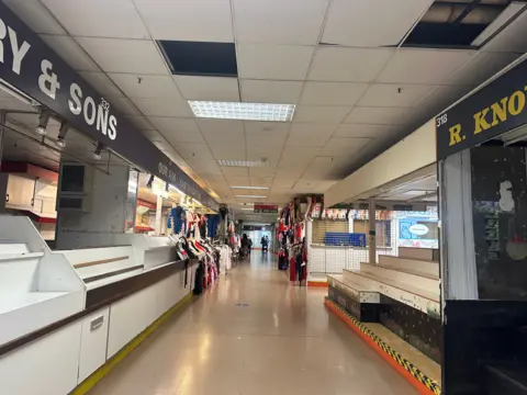 Maria Rubio/BBC A general view of the now largely empty Victoria Market in Nottingham.