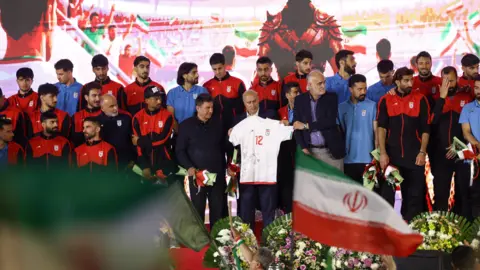 Iran players and officials in Enqelab Square in Tehran