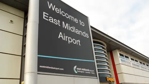 Getty Images A sign reading "Welcome to East Midlands Airport"