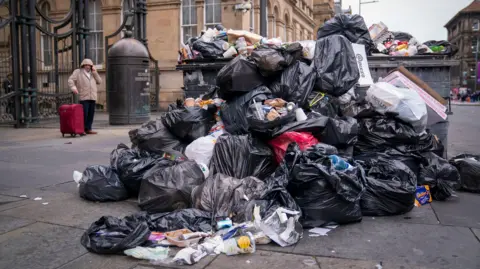 PA Media Rubbish piled up on Chambers Street