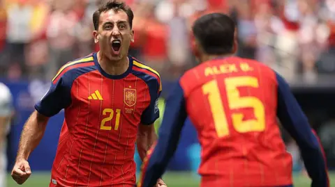Mikel Oyarzabal celebrates scoring for Spain against Austria