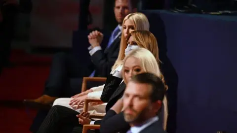 AFP (From top) Eric Trump, son of the US President, daughter and Senior Advisor to the US President Ivanka Trump, US First Lady Melania Trump, daughter of the US President Tiffany Trump and Donald Trump Jr., son of the US President, are seen ahead of the first presidential debate at the Case Western Reserve University and Cleveland Clinic in Cleveland, Ohio on September 29, 2020