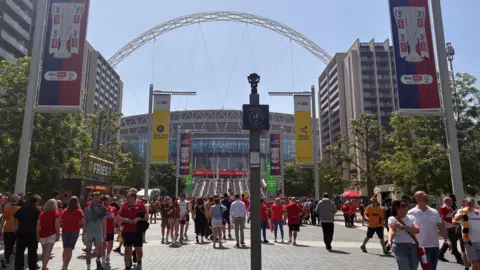 Wembley Stadium with a large banner on the front of it, under the famous arch, stating: "40 finals. Celebrating 40 years of the play offs".