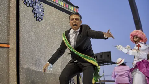 Getty Images Samba performer depicting President Bolsonaro