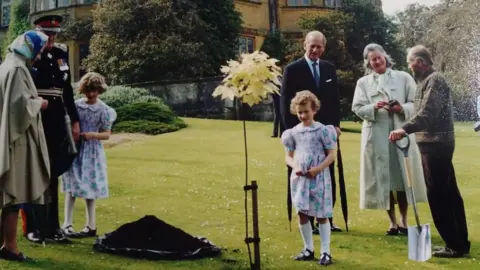 Minterne Estate The Queen planting a tree at Minterne House in Dorset surrounded by members of the Digby family