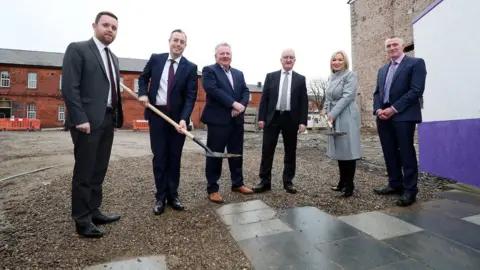 Kelvin Boyes / Press Eye Paul Givan and Michelle O'Neill visit the site of a new hotel in Londonderry's Ebrington Square
