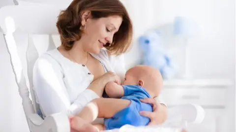 Getty Images Mother breastfeeding