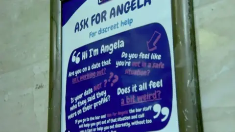 A public safety poster designed to help people who feel unsafe during a date or social situation. It features the heading “Ask for Angela For discreet help.” The poster explains that if someone feels uncomfortable, threatened, or like their date isn’t who they claimed to be, they can go to the bar and quietly ask for “Angela.”