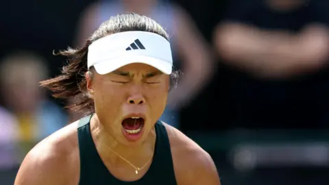 Mimi Xu celebrates winning a point during the 2025 Nottingham Open