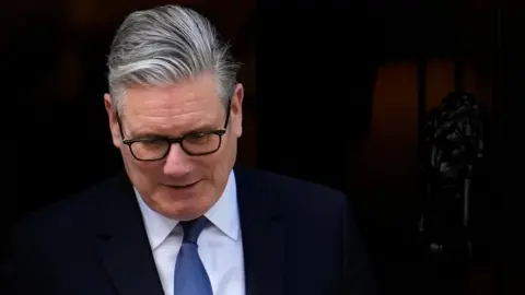 PA Media Keir Starmer looks down 