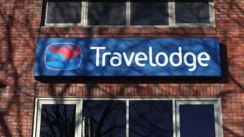 A Travelodge sign outside one of its hotels
