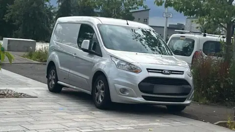 Peter Collins Car parked on street