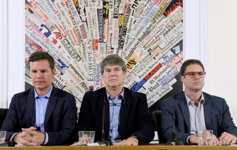 Getty Images Chilean sexual abuse victims Jose Andres Murillo (R), James Hamilton (C) and Juan Carlos Cruz (L), hold a news conference at the Foreign Press Association in Rome on May 2, 2018
