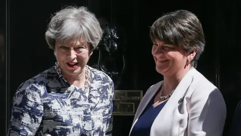 AFP Contributor Theresa May and Arlene Foster