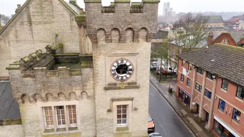 Qays Najm/BBC An aerial shot of County Hall in Ipswich, featuring a side shot of the building showing a smashed clock