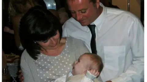 Julie Flaherty Julie Flaherty with her husband and son Jake