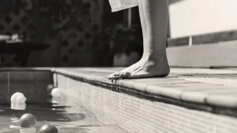 Rawpixel Feet by a swimming pool