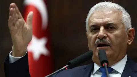 AFP Turkish PM Binali Yildirim delivers a speech at the Grand National Assembly of Turkey in Ankara on 31 October 2017
