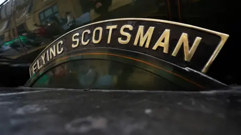 PA Media A close up of the Flying Scotsman on Platform 8 at King's Cross Station in London. 