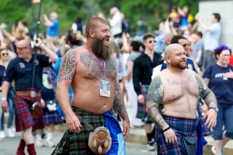 EPA Bare-chested Tartan Army footsoldiers
