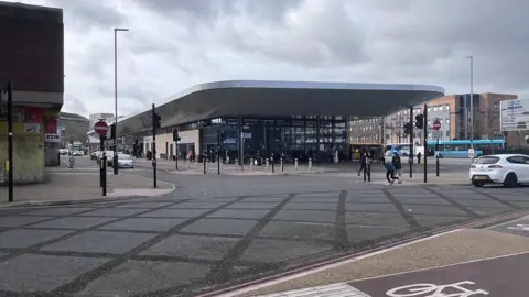 BBC The road at the junction of Abbey Street and Gravel St