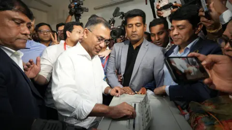 Bangladesh Nationalist Party (BNP)/Reuters Bangladesh Nationalist Party (BNP) Chairman Tarique Rahman votes inside a polling station during the national election in Dhaka