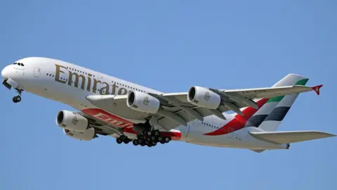 Getty Images An Emirates Airbus A380-861 with the new livery is taking off from Barcelona-El Prat Airport in Barcelona, Spain, on April 12, 2024. (Photo by Joan Valls/Urbanandsport/NurPhoto via Getty Images)