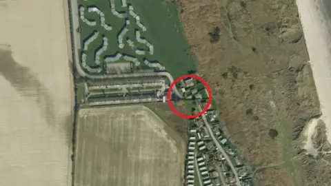 Google Aerial view highlighting the small section closed off