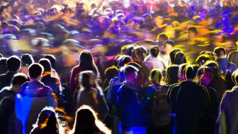 Getty Images Crowd of people on a night out