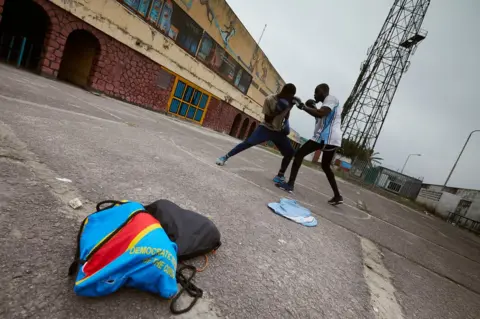 Hugh Kinsella Cunningham Two fighters spar